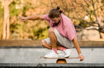 Athletic guy on a balance board