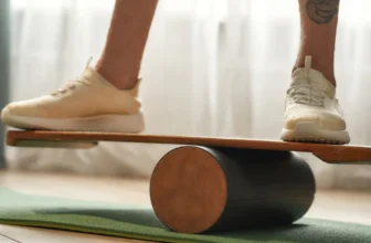 guy balancing on balance board